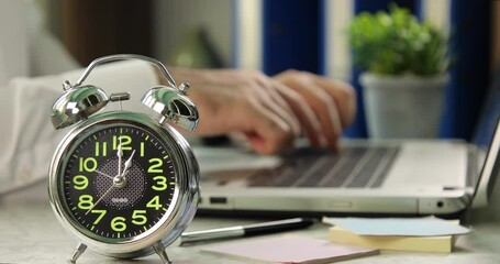 Office worker going to lunch, an alarm clock. Work Time concept 1 am