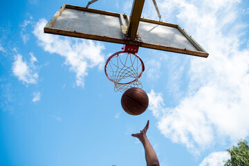 Streetball, street game, ball in the basket