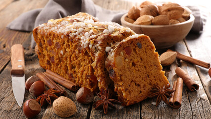 gingerbread cake and ingredient on wood background