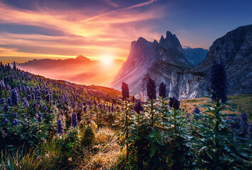 Unsurpassed sunrise in the Dolomites alps. Wonderful Nature scenery with dramatic colorful sky....