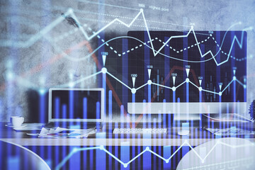 Double exposure of forex chart and work space with computer. Concept of international online trading.
