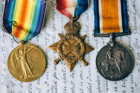 First World War Campaign medals resting on an old letter