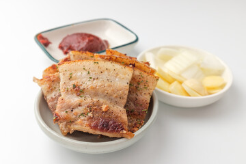 Grilled pork belly on white background