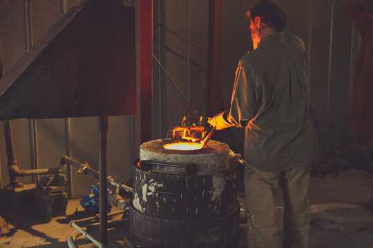 craftsman preheating bronze ingots