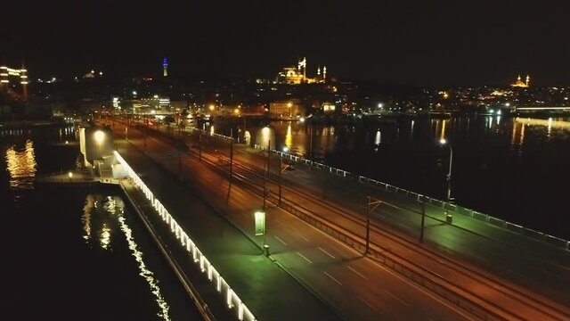 Istanbul Galata bridge area at night drone footage on pandemic days