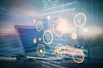 A man working on Laptop with technology theme drawing. Concept of big data. Double exposure.