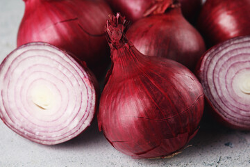 Some red onions on the table	