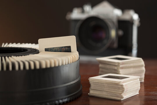 Slide projector tray and 1960s era 35mm SLR