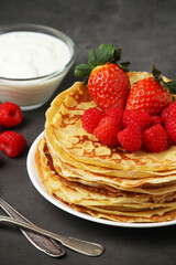 Russian cuisine national dish bliny with fresh berries