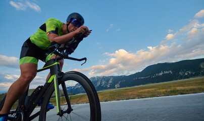 triathlon athlete riding bike