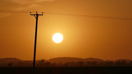 Naklejka premium Hazy sunset over Lincolnshire