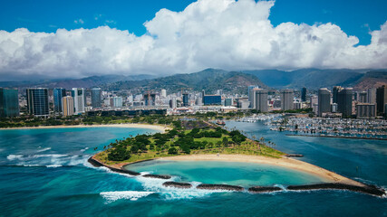 Aerial Magic Island Lagoon. Magic Island is a small man-made peninsula in Honolulu, Oahu Hawaii,...