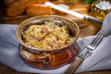 Pasta with sauerkraut and sausage.
