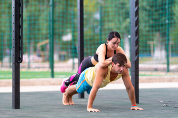 Young man in the yoga plank position