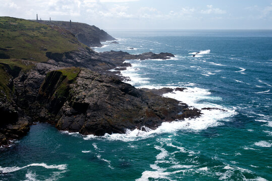 Cornwall in England Coastline, with chimneys from an old tin mine in the background