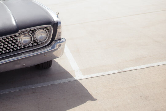 Closeup of beautiful 60s car front lights