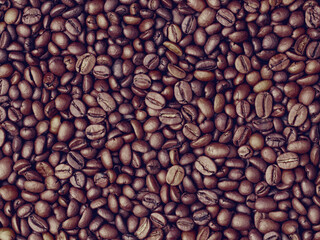 Vintage coffee beans closeup background, retro instagram style filtered