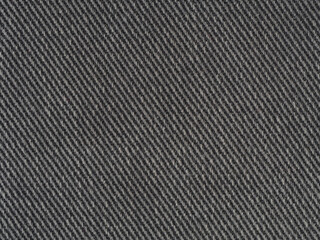 Black denim jeans fabric closeup texture background pattern