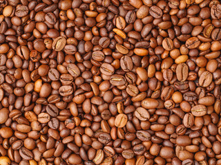 Roasted coffee beans closeup background, texture, pattern
