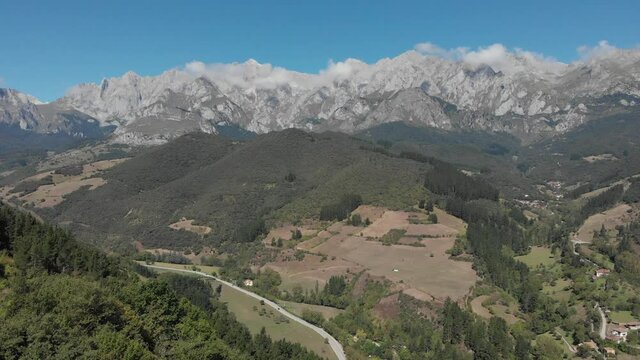 DRONE AERIAL FOOTAGE: The Picos de Europa (Peaks of Europe) a mountain range part of the Cantabrian Mountains in northern Spain.