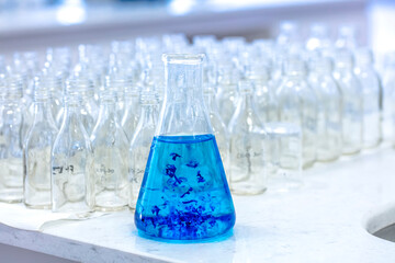 blue solution (methylene blue) in erlenmeyer, experiments in chemistry laboratory