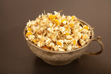 Dry chamomile herbal tea background