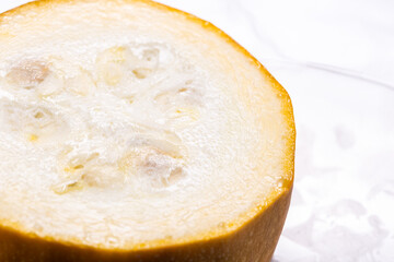 Sliced yellow straightneck squash, close up texture
