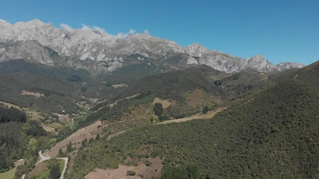 DRONE AERIAL FOOTAGE: The Picos de Europa (Peaks of Europe) a mountain range part of the Cantabrian Mountains in northern Spain.