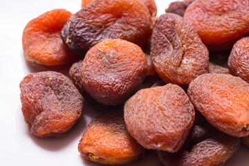 Sun dried brown apricots, traditional  fruit. Close up
