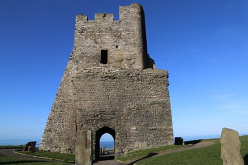 Fototapeta na wymiar The remains of the north tower gateway at the Castle in Aberystwyth, Ceredigion, Wales, UK.