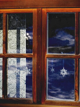 christmas ornaments on window