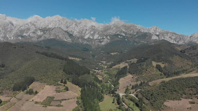 DRONE AERIAL FOOTAGE: The Picos de Europa (Peaks of Europe) a mountain range part of the Cantabrian Mountains in northern Spain.