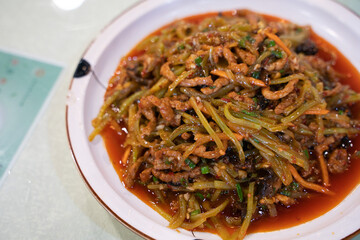 Fish-flavored shredded pork with sichuan pepper spicy sauce, a traditional Sichuan dish in China.