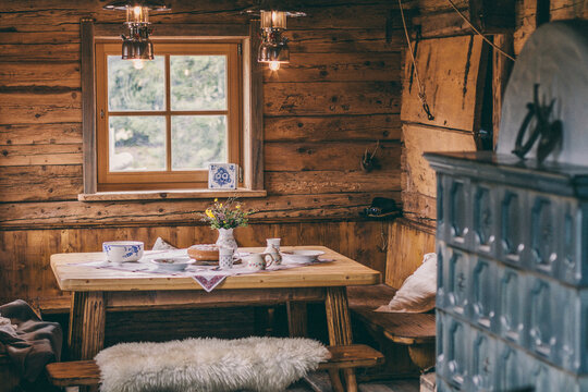 rustic livingroom inside a typical wooden alpine cabin