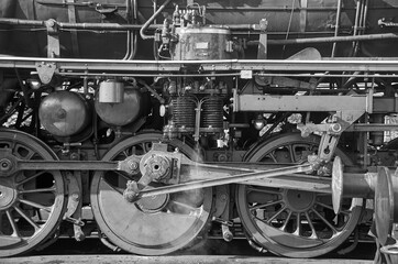Steam locomotive machine and wheels black and white