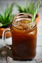 iced coffee with a reusable straw