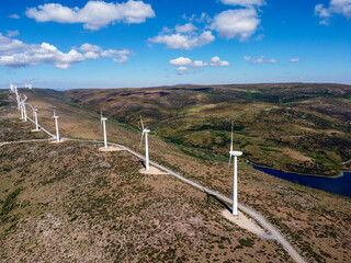 Fototapeta na wymiar Aerial view of wind turbines for power generation. Concept eco clean energy production. Renewable energy