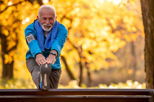 Senior Man Stretching Outdoors.