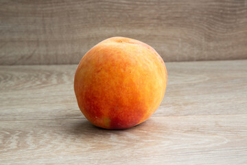 Ripe peaches on a white background and a tree background