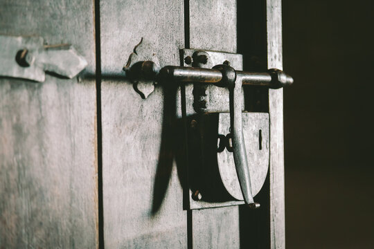 Medieval Padlock on a Wooden Door