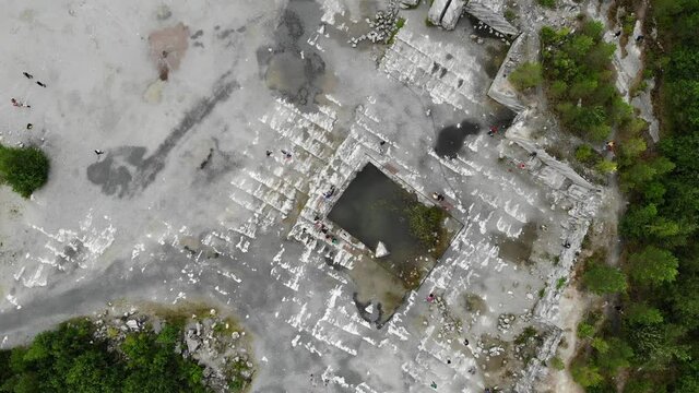 Aerial marble canyon Ruskeala. old quarry stone mining of stones. drone rotating
