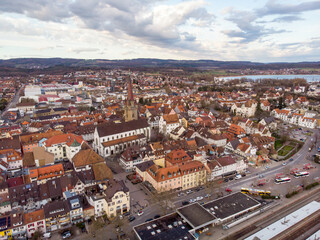 Fototapeta na wymiar Aerial Still Shot of South German City Radolfzell near Lake Constance at March at Cloudy Weather