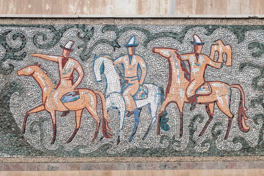 Wall mural of three men on horses, Osh, Kyrgyzstan.