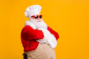 Turned photo of fat santa claus in cuisine chef headwear cross hands prepare x-mas christmas...