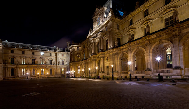 PARIS, FRANCE - MARCH 8: palais des arts of Louvre at night in Paris on March 8, 2013. The museum opened on 10 August 1793 with an exhibition of 537 paintings.