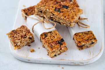 Homemade granola bars with nuts, seeds, chia seeds and dried cherries.
