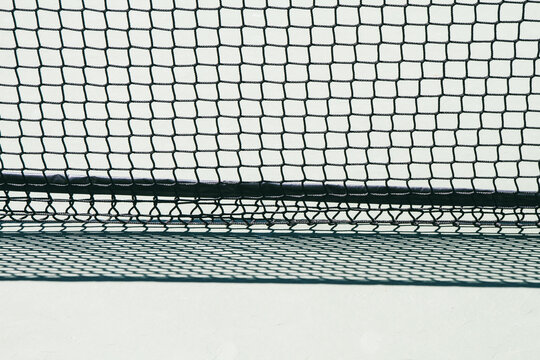 Tennis net in a tennis court