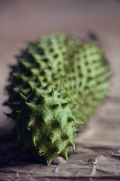 Closeup of the spiny green outside of the soursop fruit