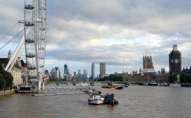 London afternoon. London eye, County Hall, Westminster Bridge, Big Ben and Houses of Parliament.