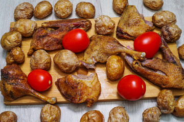 Crispy baked duck with potatoes